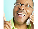 Mature man talking on mobile phone smiling Mature man talking on mobile phone smiling