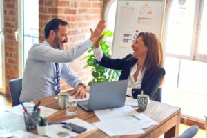 Financial team high five