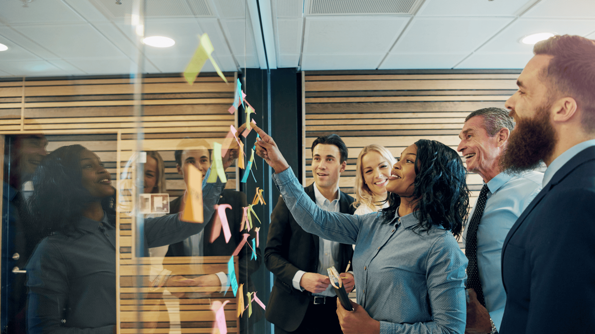 mployees of different ages collaborating in an age-inclusive workplace
